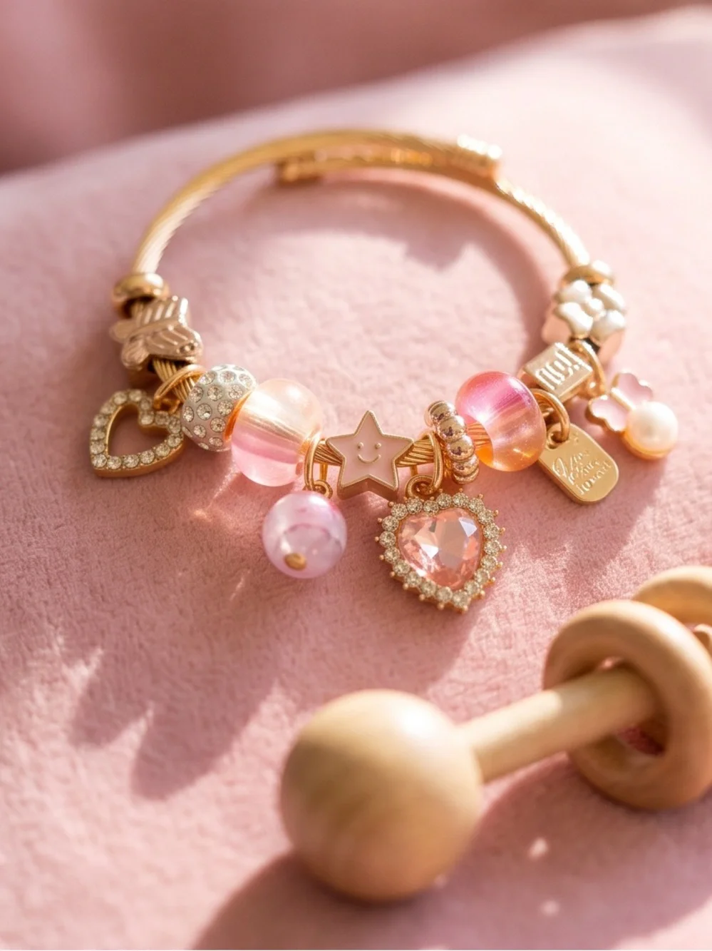 Gold-Tone Pink Charm Bracelet with Heart and Star Accents